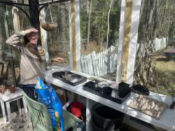 Mel working in the greenhouse.