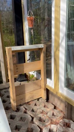 Shelf legs supported by walls.